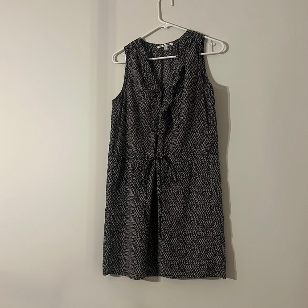 Black short dress ties around the waist.
